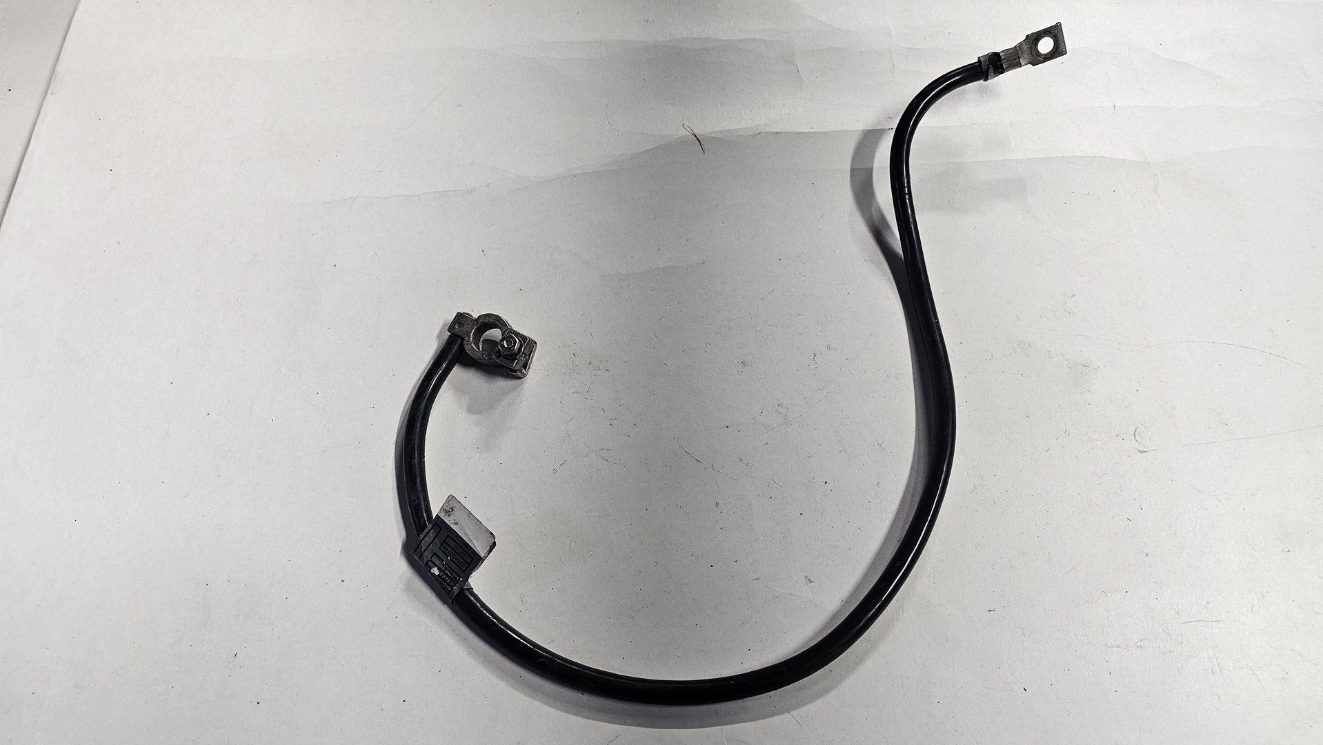 Accukabel negatief min kabel BMW X5 serie E53 61116919976 6919976 battery terminal clamp usado en Menorca