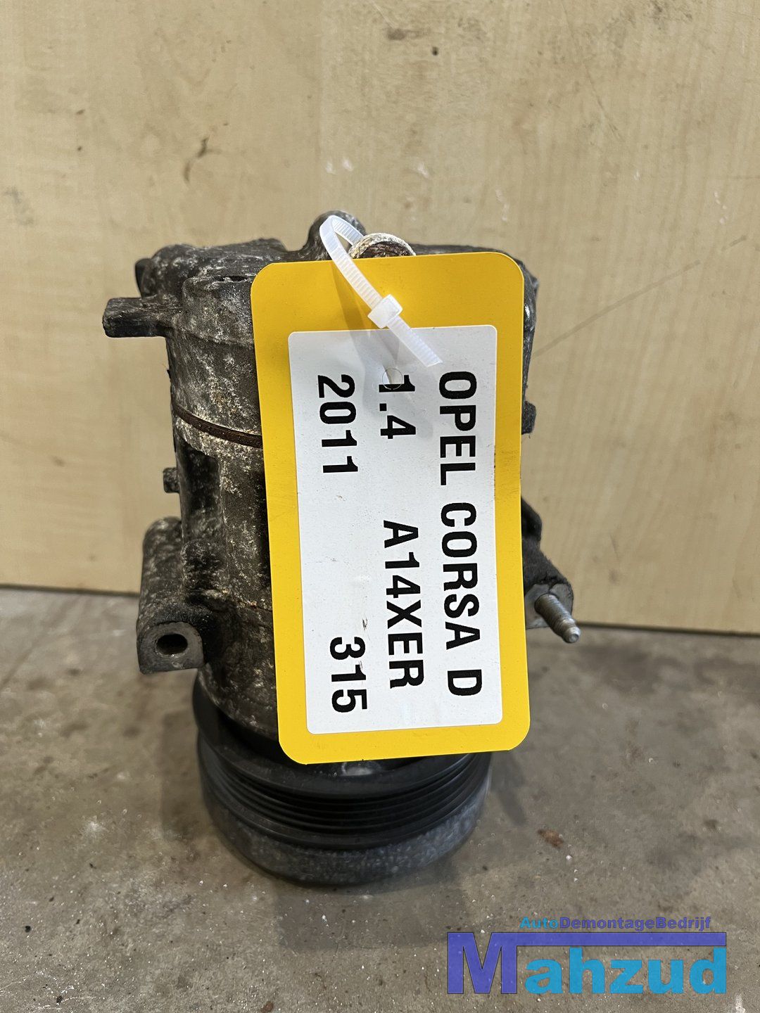 OPEL CORSA D 1.4 A14xer Aircopomp 55701200 G02 air conditioning pump air conditioning compressor usado en Menorca