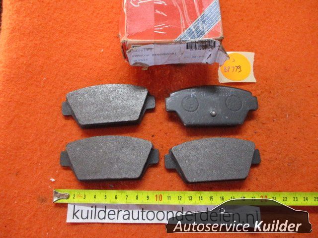Remblokken achter Mitsubishi Colt Eclipse Galant Lancer BP779 originalineel MZ690008 brake pad set usado en Menorca foto 15