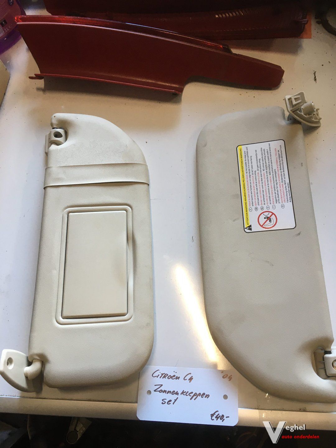 Citroen C4 2004 Zonnekleppen set sun visor left and right usado en Menorca