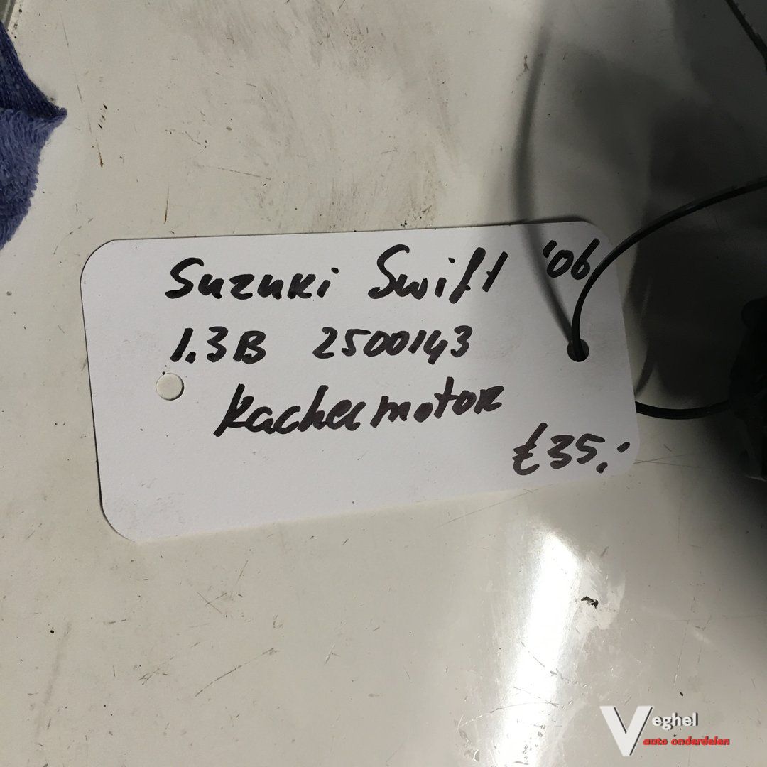 Suzuki Swift 1.3 gasolina 2006 2500143 Kachelmotor AV272700-0311 heater engine booster usado en Menorca