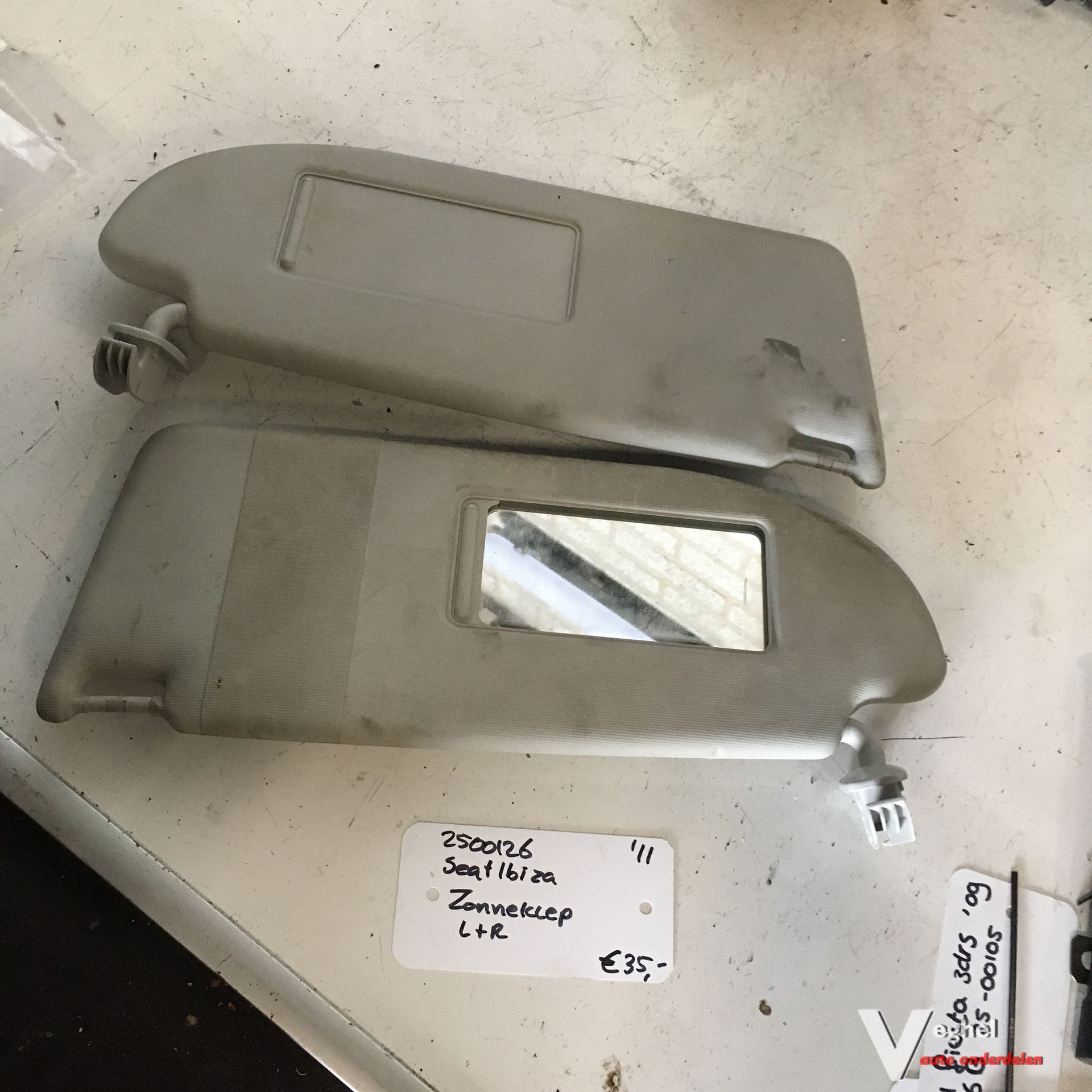 Seat Ibiza 2011 1.2 tdi 5drs 2500126 Zonnekleppen set sun visor left and right usado en Menorca