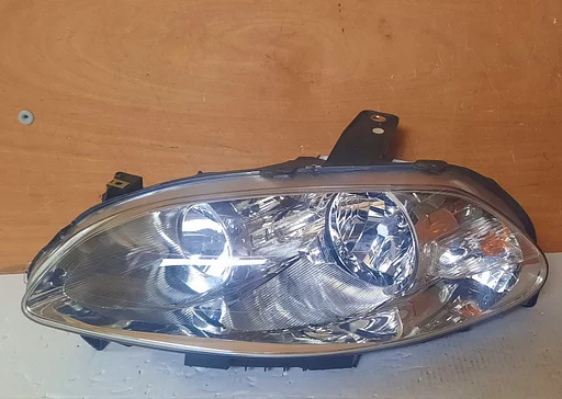 Koplamp links orgineel nieuw Fiat Croma 2005-2007 51733561