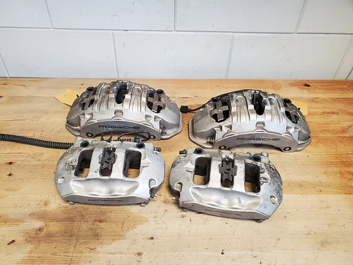 Porsche Cayenne / Panamera 4 pots remklauw set ACHTER €299