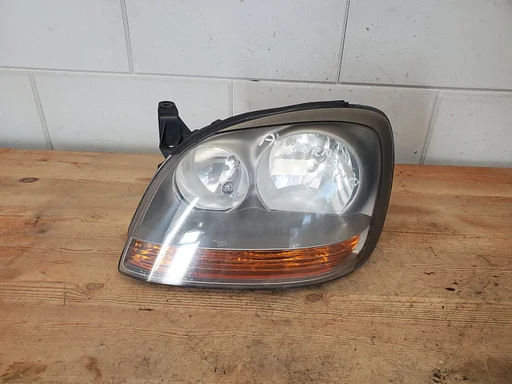 Nissan Almera Tino 2000 - 2007 koplamp links oranje knipper