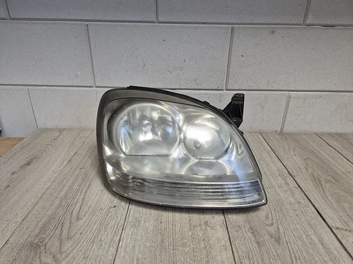 Nissan Almera Tino 2000 - 2006 koplamp rechts witte knipper