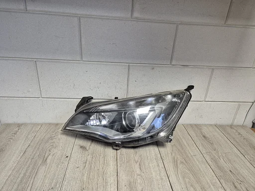 Opel Astra J 2009 - 2014 xenon koplamp links 13374517 €295