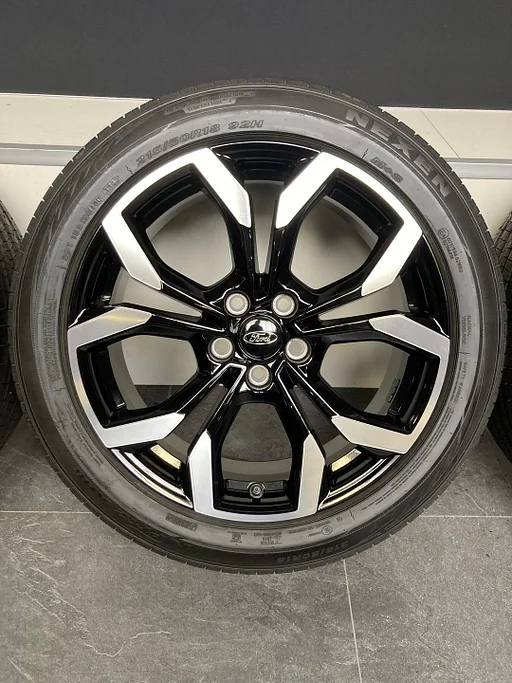 18” originele Ford Puma velgen + allseason banden 5x108 L1TC-RA