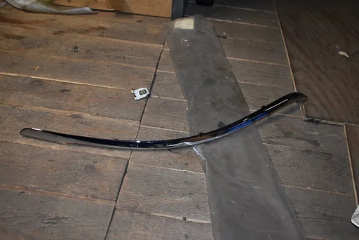 Stootlijst koplamp RH Saab 9-5 '06-'09