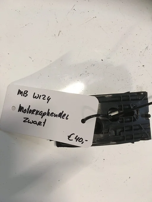 Mercedes w124 Motorkaphendel in het zwart origineel mercedes