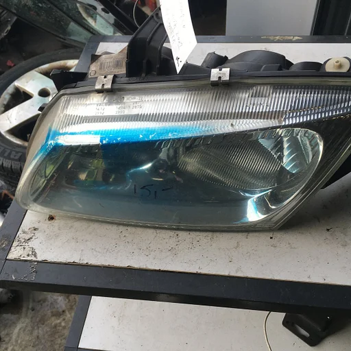 Nissan Almera 2001 Koplamp Links