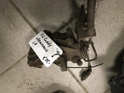 VW Caddy '10 remklauw Linksachter