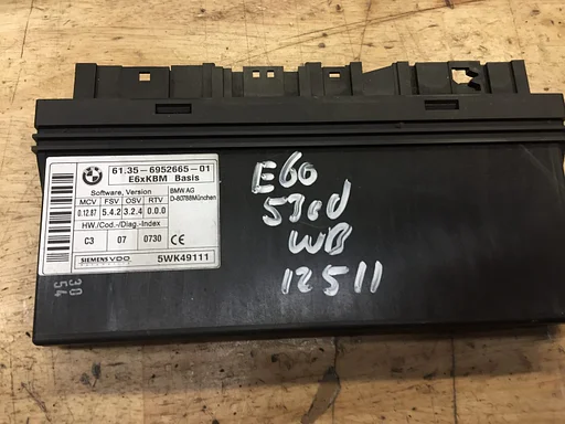Comfort module BMW E60 E61 2005  oe 6952665