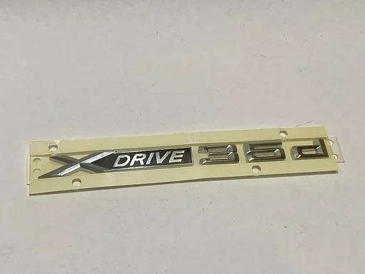 EMBLEEM BMW X6 E71 X DRIVE 35D OE 51147208557