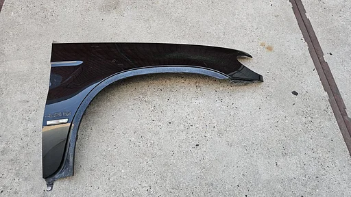 Voorscherm spatbord rechtsvoor BMW X5 serie E53 kleur 475 en 354 41357000386 7000386