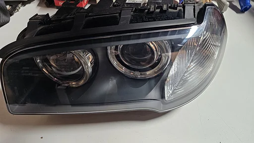 Koplamp Bi Xenon dynamic AKL bochtverlichting BMW links BMW X3 serie E83 7162205 63123456045 3456045