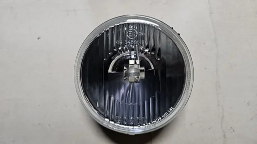 Koplamp grootlicht links Bosch BMW 3 serie E30 63121385461 1385461 1305601141