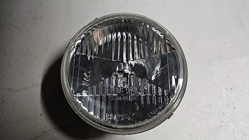 Koplamp grootlicht links Bosch BMW 3 serie E30 63121385461 1385461 1305331903