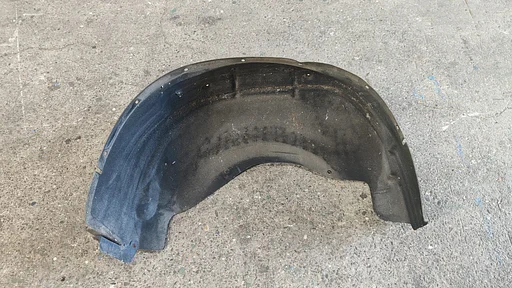 Binnenscherm Wielkuip Modderkuip achterzijde links BMW X6 serie E71 51717248211 7248211