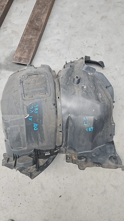 Set Binnenscherm Wielkuip Modderkuip voorzijde BMW X1 serie E84  51712990089 2990089 51712990090