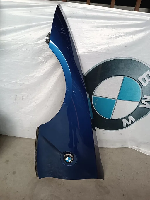 Voorscherm Spatbord linksvoor BMW Z4 Serie E85 E86 Montegoblau met. A51 41357053327 7053327