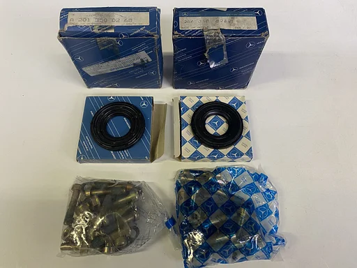 NOS reparatieset aandrijfaskeerring L+R Mercedes-Benz W201
