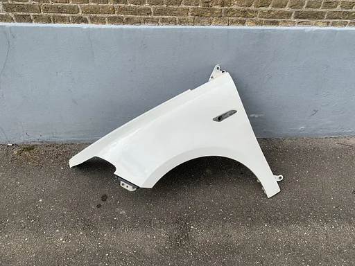 zijscherm / spatbord links lancia Ypsilon 2011 tot 2014 wit