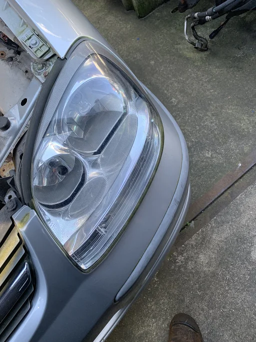 koplamp links nissan almera tino 2003 tot 2006 26010BU800