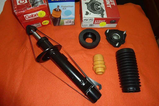 Schokdemper incl, stofhoes en verpootschotel rechts voorzijde Ford Fiesta/Mazda 2 gasdruk Nieuw