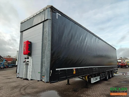 Fliegl SDS 3-axle SAF - MEGA - 6310KG - Sliding tarpaulin/roof - Disc brakes - Coil gutter - Toolboxes