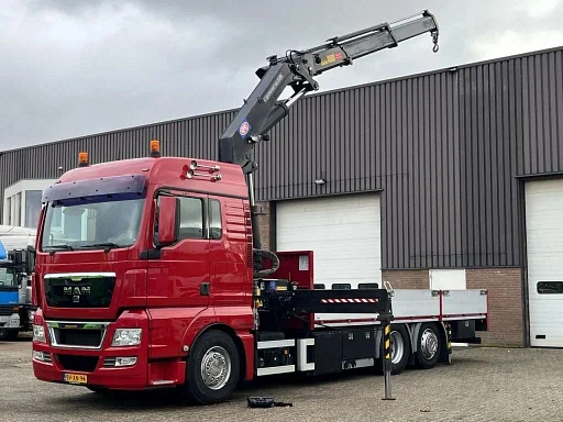 MAN TGX 26.400 / HMF 42 T/Mtr kraan / Radio Remote / 597.406 km / NL Truck / 6x2 / TOP!!!