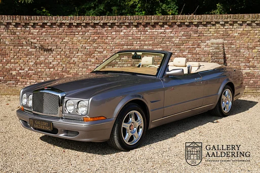 Bentley Azure Convertible "Symbolic Edition" "Symbolic Edition" - One of only 19 built by Mulliner, Rare and desirable "Symbolic Edition" - Full of bespoke options, Less than 12000 miles, Presented in "Silver Storm" with hand finished "Two-tone Beige" leather interior, The Bentley Azure "Symbolic" is a Dealer Limited Edition, In a pristine condition