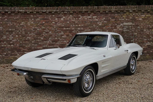 Corvette C2 Sting Ray Split Window Rare one-year-only 'Split Window' Coupé, Restored condition, Original factory colors: Ermine White with black leatherette, 4-Speed Manual Transmission-equipped, Highly collectible Split Window Corvette with exquisite looks ,