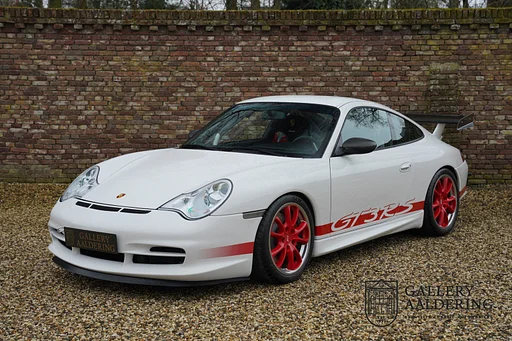 Porsche 996 996 GT3 RS Mint condition and original factory-specified, Less than 40000 documented kilometers, Comprehensive history file including original board map and booklets, Ordered in Carrera White with Guards Red wheels and decals, In Germany sold Porsche GT3 RS, “Mezger” 3.6-litre naturally aspirated flat-six motore equipped