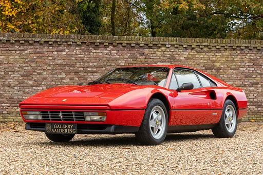 Ferrari 328 GTB "32.217 kms from new" TOP Quality example! Recent timing belt replacement and service performed, Newly delivered in Switzerland-Zurich by official Ferrari dealer,Interior in remarkably good condition, Accompanied by Ferrari leather document pouch with (service-)booklets, Abgas-Wartungsdokument “Exhaust maintenance document” with registered mileage present,Rosso Corsa exterior-Black leather