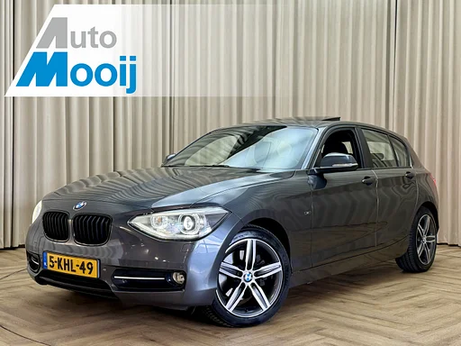 BMW 125 1-serie 125i *Sportline* Leder / Schuif/Kanteldak / Navi Pro / Keyless / sièges chauffants / M-sport uitlaat / 17"LMV