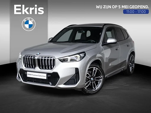 BMW X1 sDrive18i | M Sportpakket | Travel Pack | Driving Assistant Plus | Comfort Access | Achteruitrijcamera | Panoramadak | Trekhaak