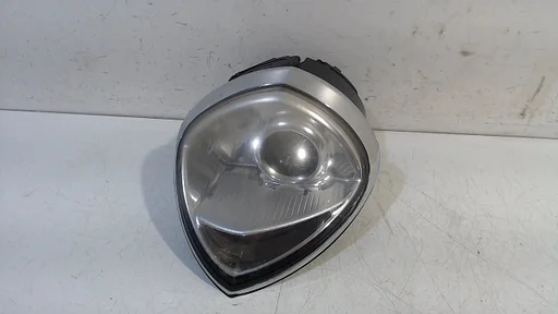 Koplamp links Lancia Thesis